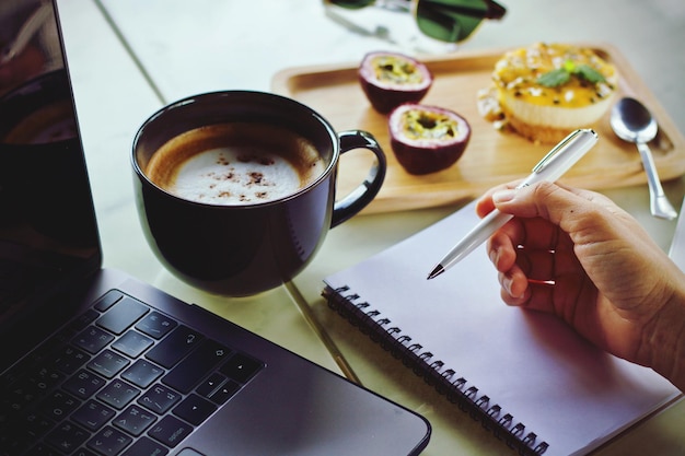 Contact hands writing note